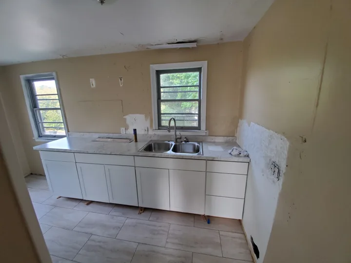 Fixr-Up: Kitchen cabinetry installation in progress