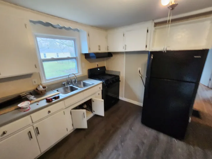 Fixr-Up: Kitchen before cabinet removal — sink view