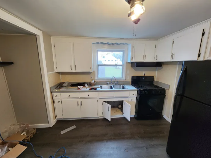 Fixr-Up: Kitchen before cabinet removal — room view