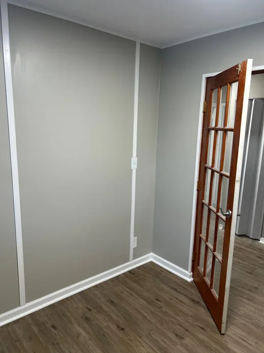 Fixr-Up: Painted walls and white trim — corner view